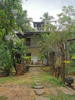 Peacock Riverside Eco Lodge